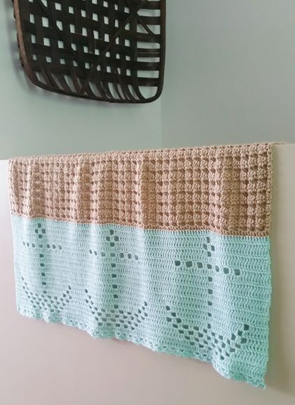 nautical filet crochet blanket - hanging